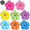 A set of eight pink, yellow, green, purple, and orange tropical flower-shaped Hawaiian luau party sunglasses and table mats.