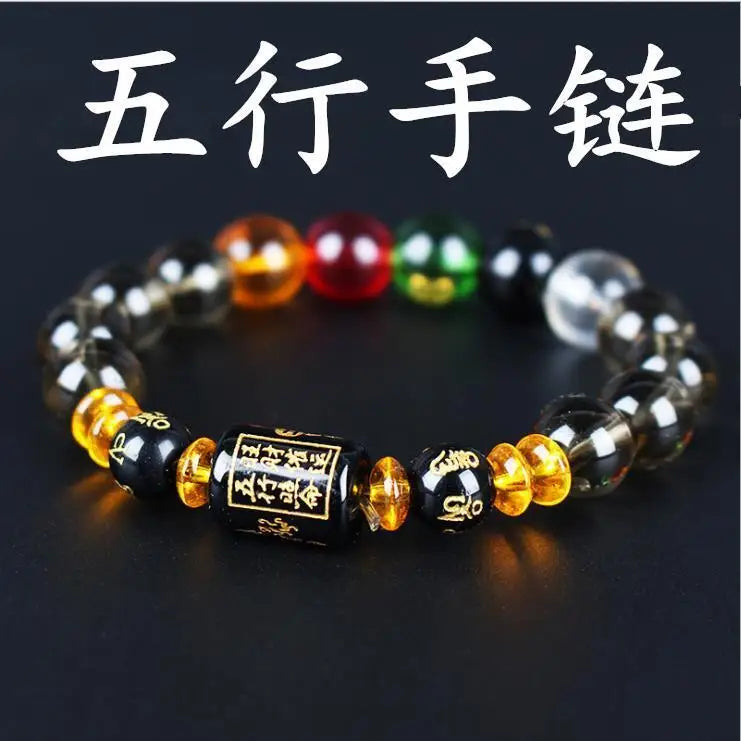 A close-up of a black crystal bracelet featuring various colored and clear stones.