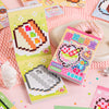 A set of handmade cartoon mini bean die cut stickers featuring various colorful designs and a pink donut.