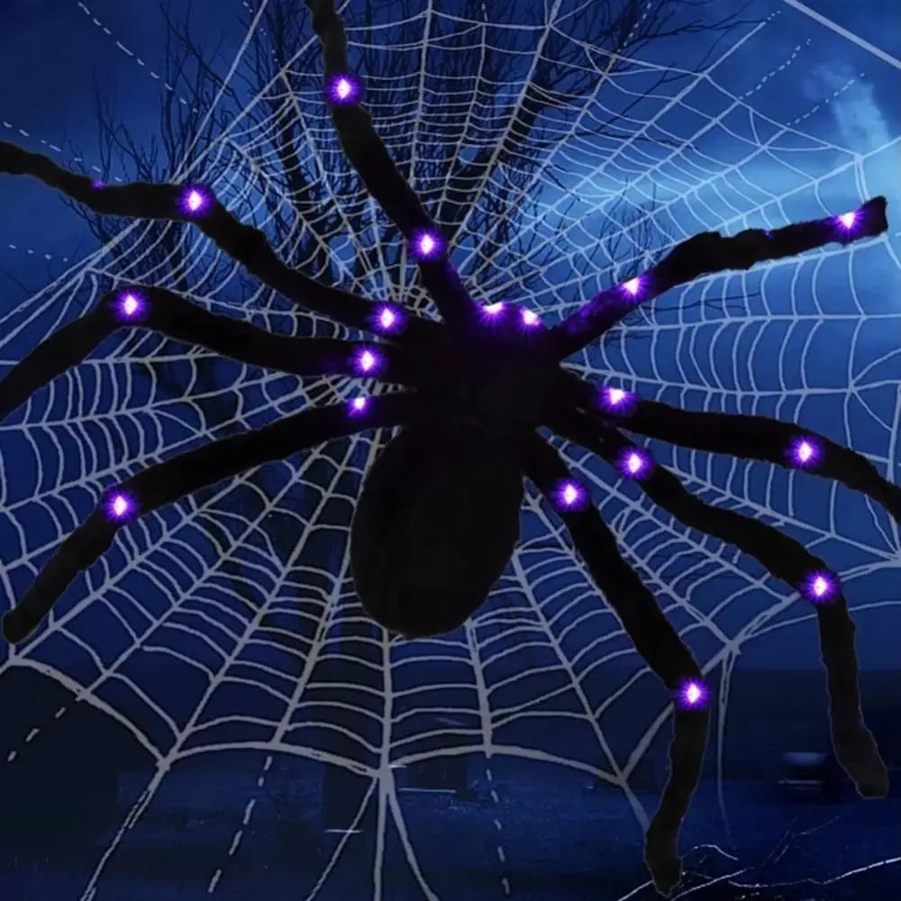 A dark spider with glowing purple lights is centered in a white web against a blue night background.