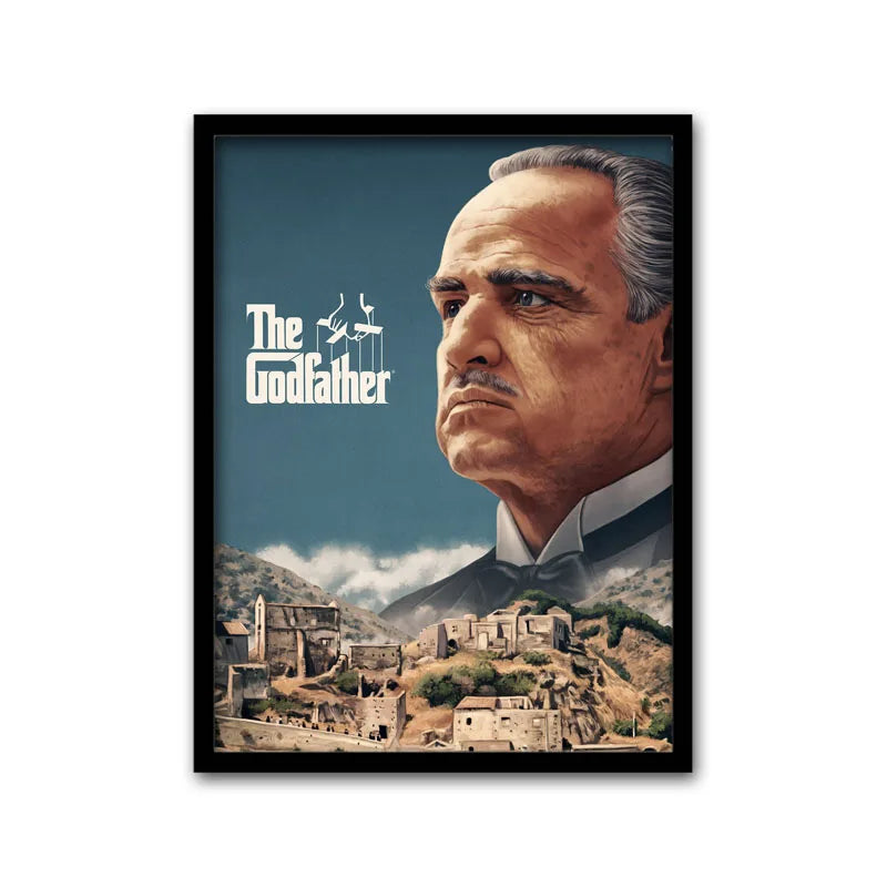 A framed movie poster featuring Marlon Brando as The Godfather against a muted blue background.
