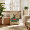 A canvas print depicting a couple dancing on a vinyl record, displayed in a bright, modern room.