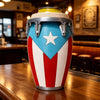 A drum-style can holder featuring a patriotic design with red, white, and blue stripes and a star, sitting on a wooden counte
