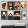A collection of nine modern geometric canvas wall art pieces featuring circular and rectangular shapes in gold, bronze, and g