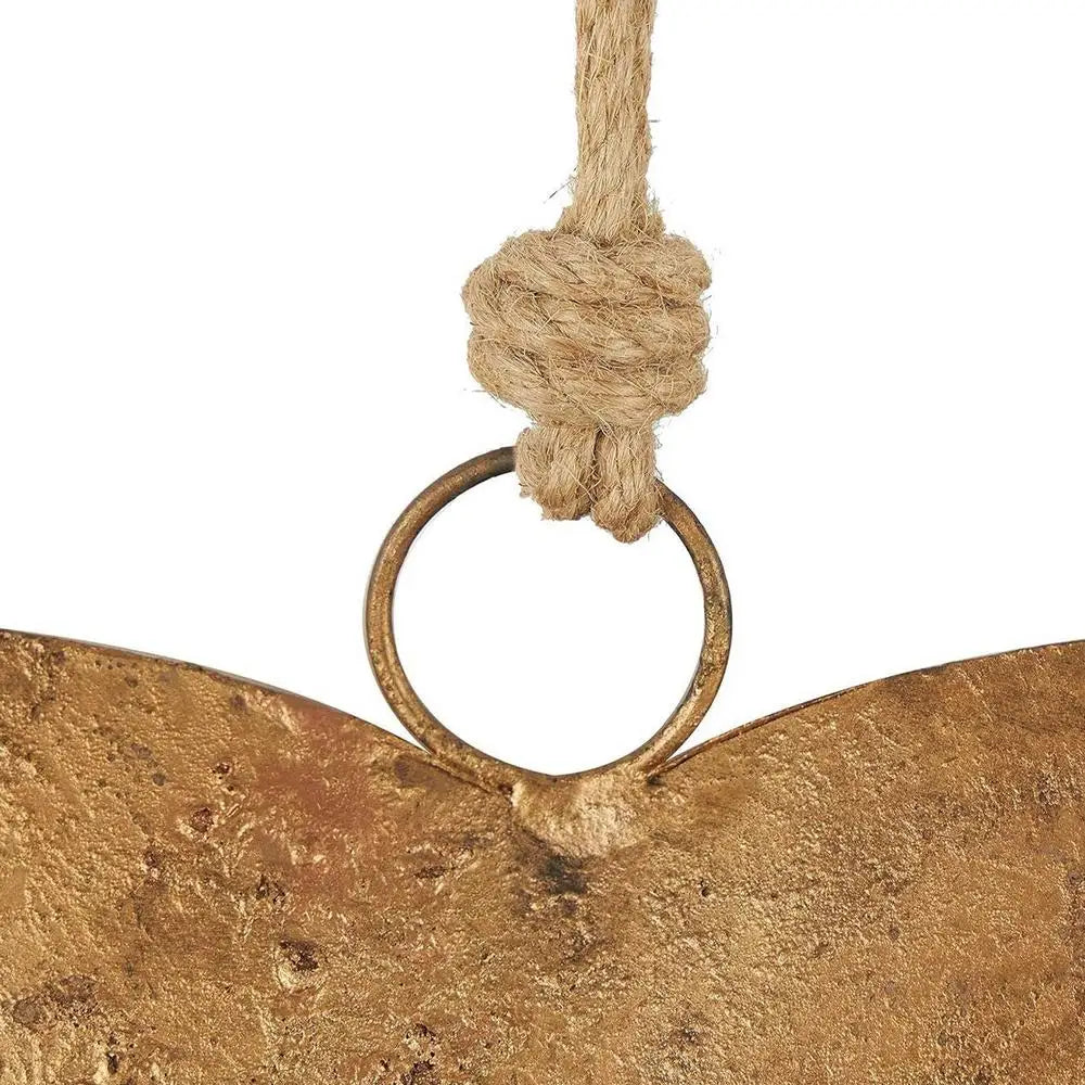 Antique golden metal heart wall decor with a natural fiber cord loop