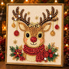 A framed diamond painting featuring a deer antler design adorned with gold and red pearls and gems.