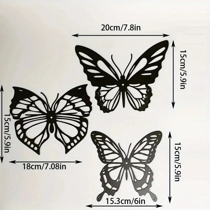 A set of three black metal butterfly wall art pieces shown with dimensions.