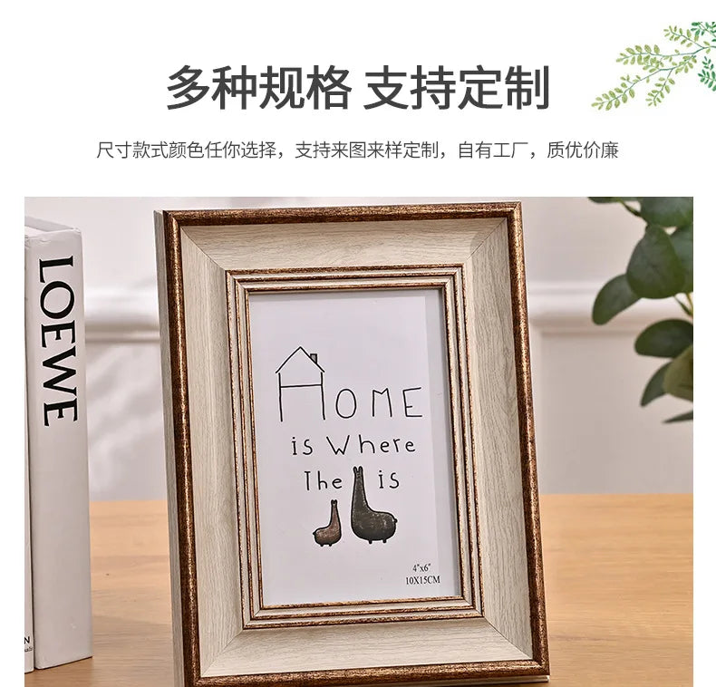A framed wooden sign with the text Home is Where the is and a silhouette of a shoe inside.