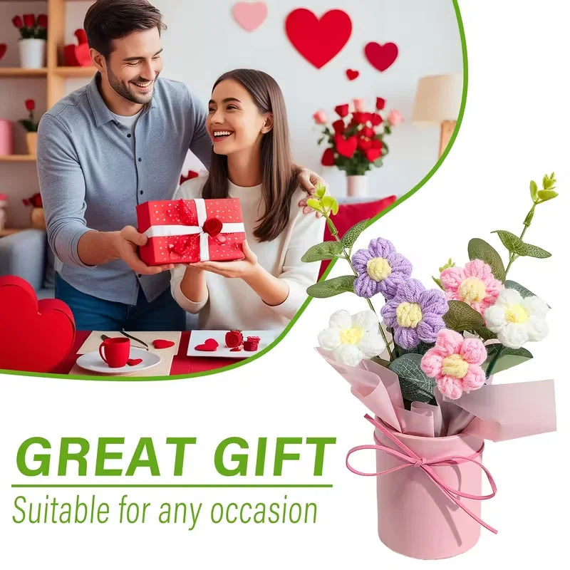 A pink handmade floral bouquet featuring various flowers and greenery in a decorative pot.