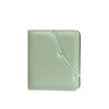A light sage green PU leather photo album with a stitched closure and spine.