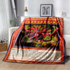 A red and orange throw blanket featuring a dragon design for the Blue-Eyes White Dragon Yu-Gi-Oh! card game.