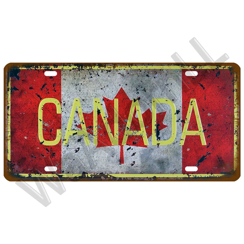 A vintage metal tin sign featuring the Canadian flag design with the word CANADA in yellow text on a distressed red and gray 