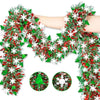 A hand is holding a festive Christmas tinsel garland with green and red foliage and white snowflakes.