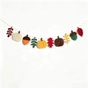 Autumn harvest felt garland featuring various seasonal elements like pumpkins, acorns, and maple leaves