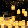 A collection of glowing white votive tea lights displayed on wooden stands against a dark, starry background.