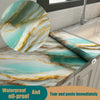 Marble pattern self-adhesive backsplash panel featuring teal and gold veining on a kitchen countertop.
