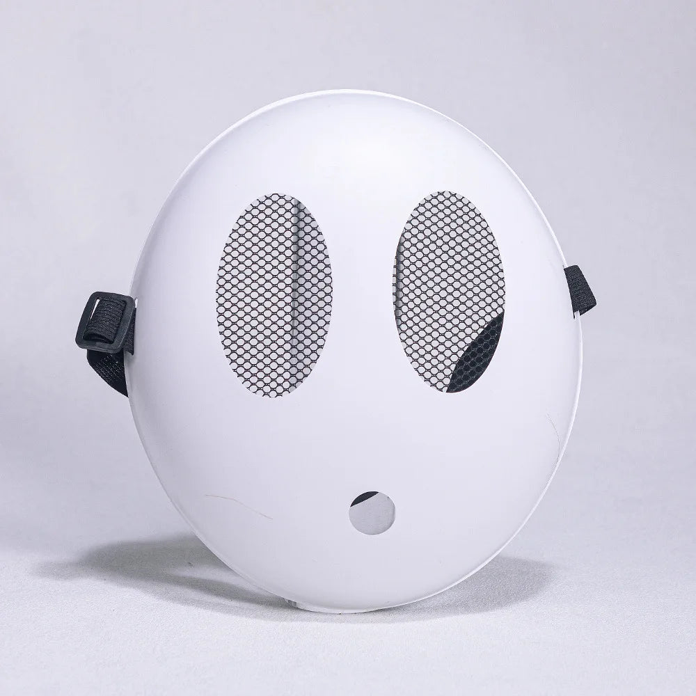 A white, spherical mask resembling a shy guy face with large eye holes and small mouth, used for cosplay or parties.