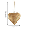 Antique golden metal heart wall decor with a hanging loop
