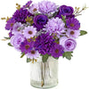 A vibrant bouquet of artificial silk roses and daisies in shades of purple and lavender.