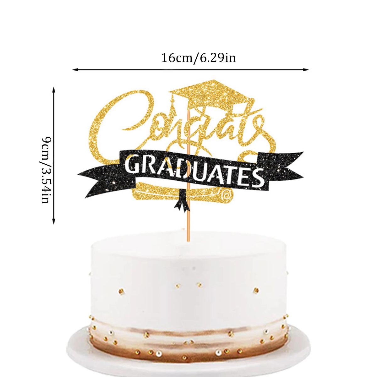 A white cake with a gold glitter topper that reads Congrats Graduates