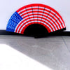 A handheld folding fan featuring the design of the American flag, displayed in a semi-circle.