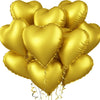 A bunch of shiny gold heart-shaped foil balloons tied together for a celebration