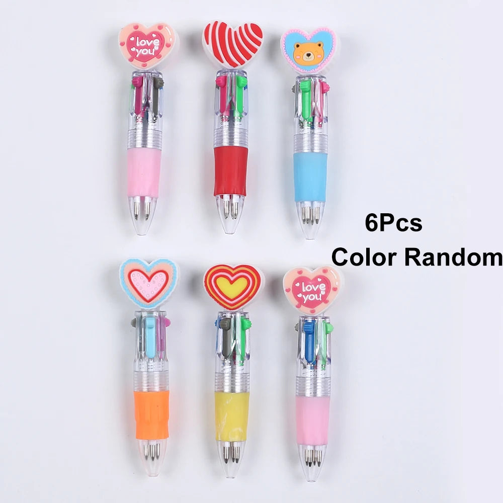 Six heart-shaped multicolor ballpoint pens in various colors and designs displayed vertically.