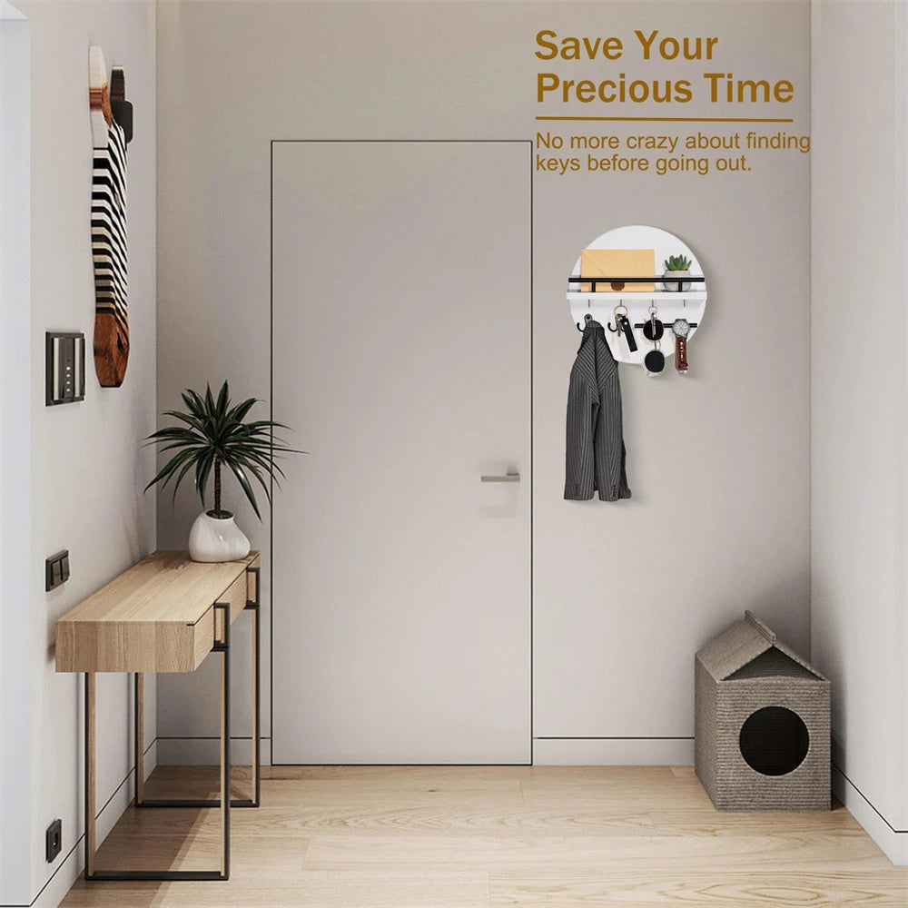 A modern entryway featuring a circular wooden wall key holder with a shelf and various keys displayed on a white board.
