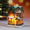A festive Christmas house night light shaped like a small wooden house with an ice cream sign and warm LED glow.