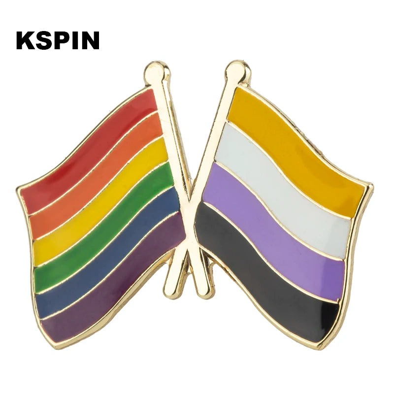 A pair of gold-edged lapel pins featuring rainbow pride flags.