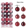 A collection of 36 festive red and rose gold glitter ornament balls packaged in a box.