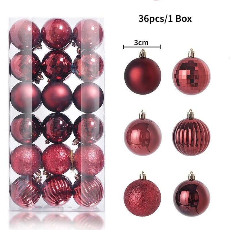 A collection of 36 festive red and rose gold glitter ornament balls packaged in a box.