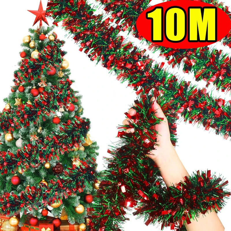 A hand is holding a festive red and green tinsel garland for holiday decoration.