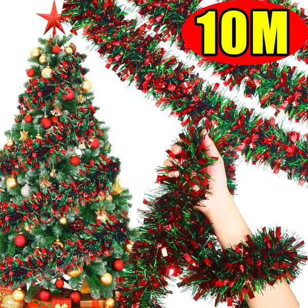 A hand is holding a festive red and green tinsel garland for holiday decoration.