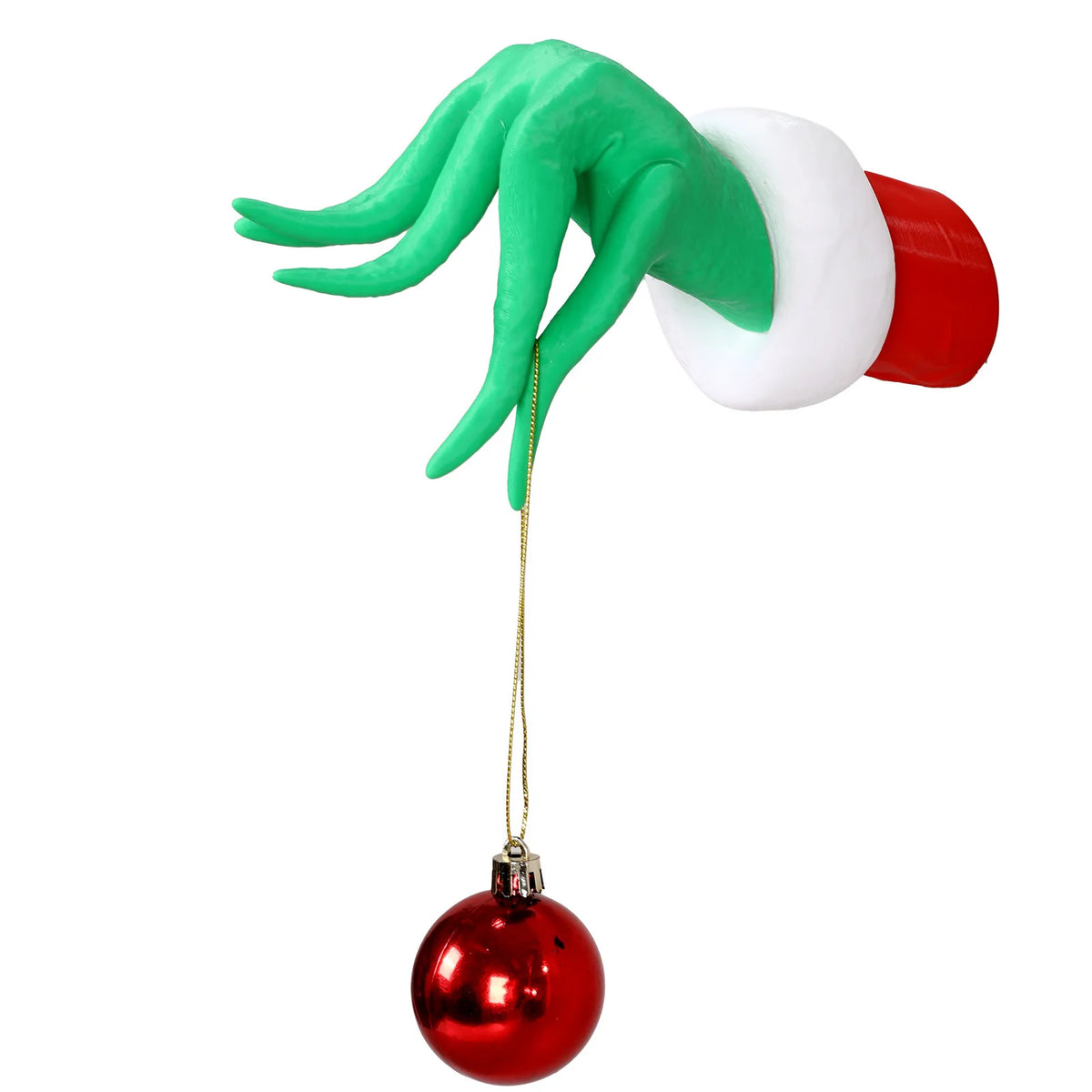 Green monster hand decoration with a red and white cuff and a hanging Christmas ornament
