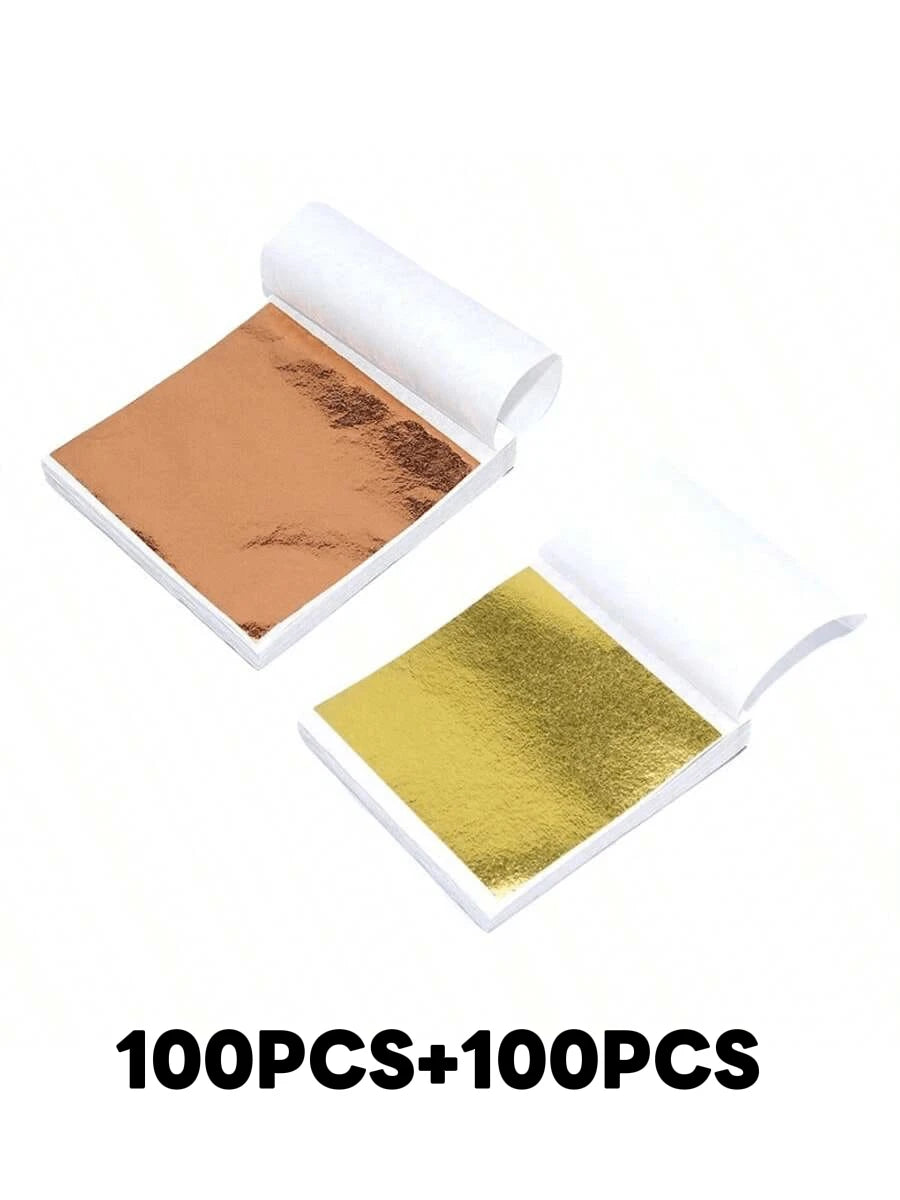 Two sheets of edible gold leaf flakes for baking and cake decoration are shown, labeled as 100 pieces plus 100 pieces.