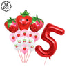 A kit of 14 strawberry-themed party supplies including strawberries, plates, cups, napkins, and a tablecloth.