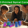A family is playing with a set of 3D printed spiral cone fidget toys on a wooden table.
