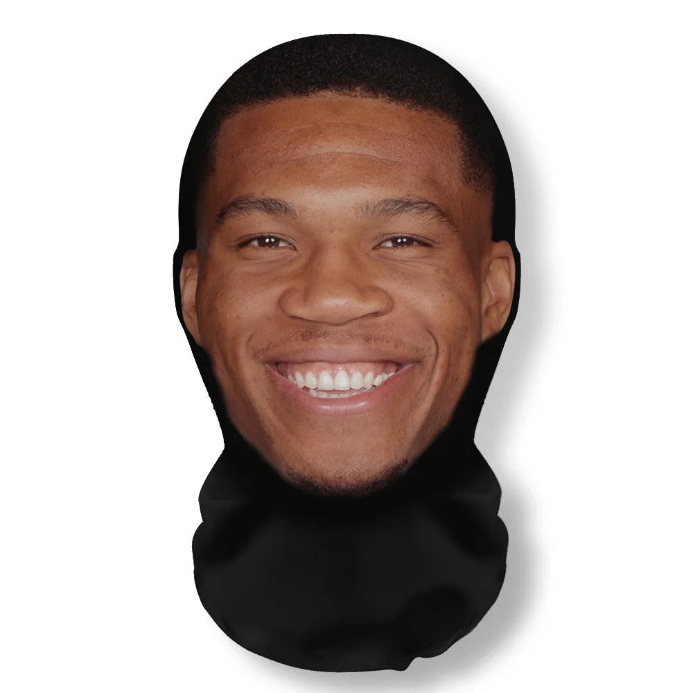 A realistic 3D printed horror balaclava mask worn by a man.