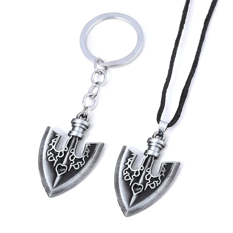 Silver arrow metal keychain with a detailed trident design and black cord