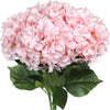 A large bouquet of pink artificial hydrangea flowers with green leaves.