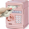 A pink combination lock piggy bank is shown with a hand inserting a banknote into the slot.