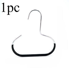 A single metal hat storage hook with a curved wire design.