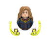 A building block figure of a female character with long brown hair wearing a dark blue and gold outfit and holding yellow ear
