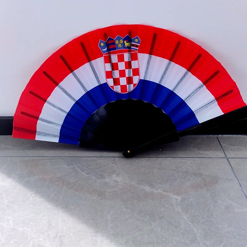 A handheld folding fan decorated with the flag of Croatia, featuring red and white stripes.