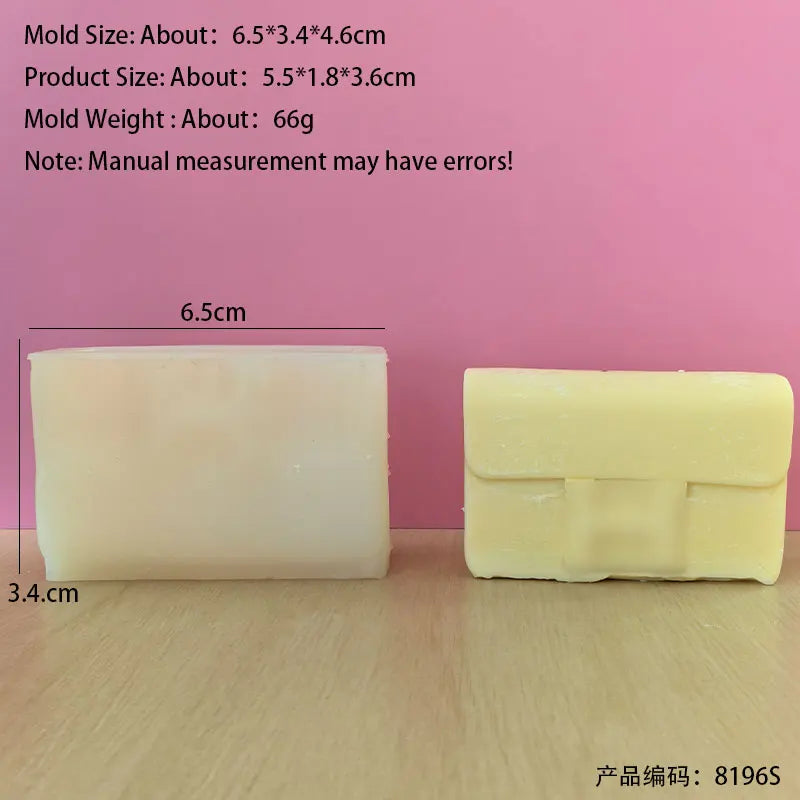 A rectangular block of pale yellow silicone mold used for making candles or crafts.
