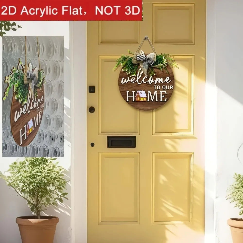 A round wooden welcome sign with greenery and a bow hanging on a yellow door.