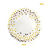A plate of white disposable party tableware decorated with gold polka dots.