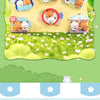 A collection of cute animal-themed fridge magnets featuring bears and other characters in a grassy outdoor setting.