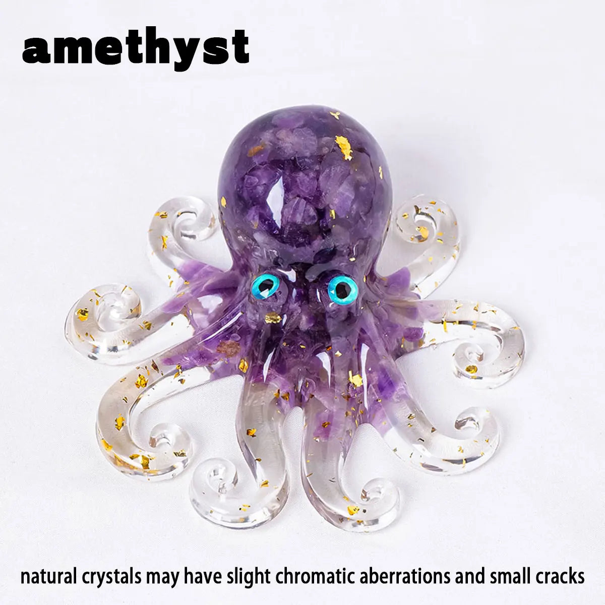 A purple amethyst crystal octopus statue with gold flecks and blue eyes